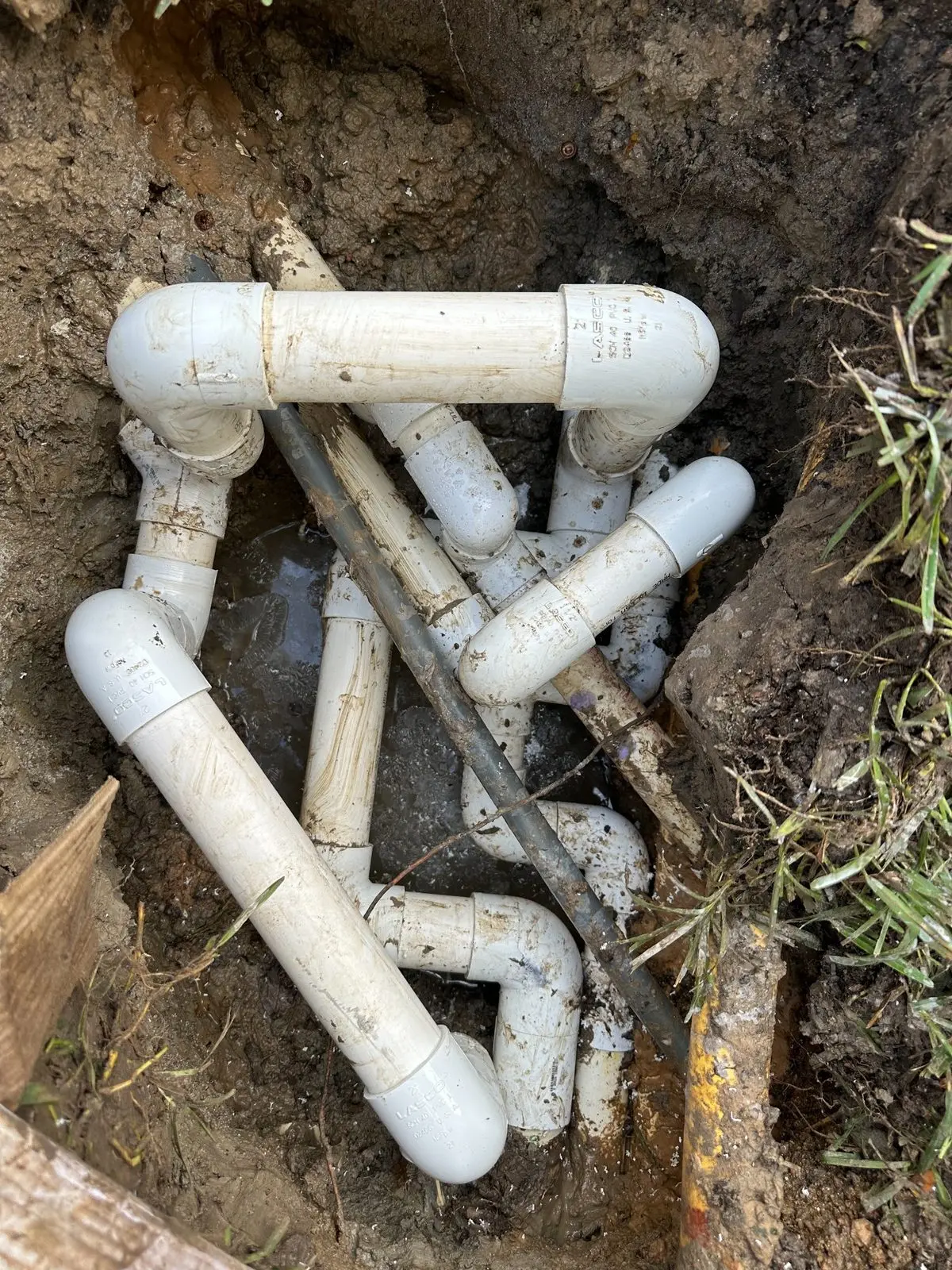 Complex underground swimming pool plumbing repair
