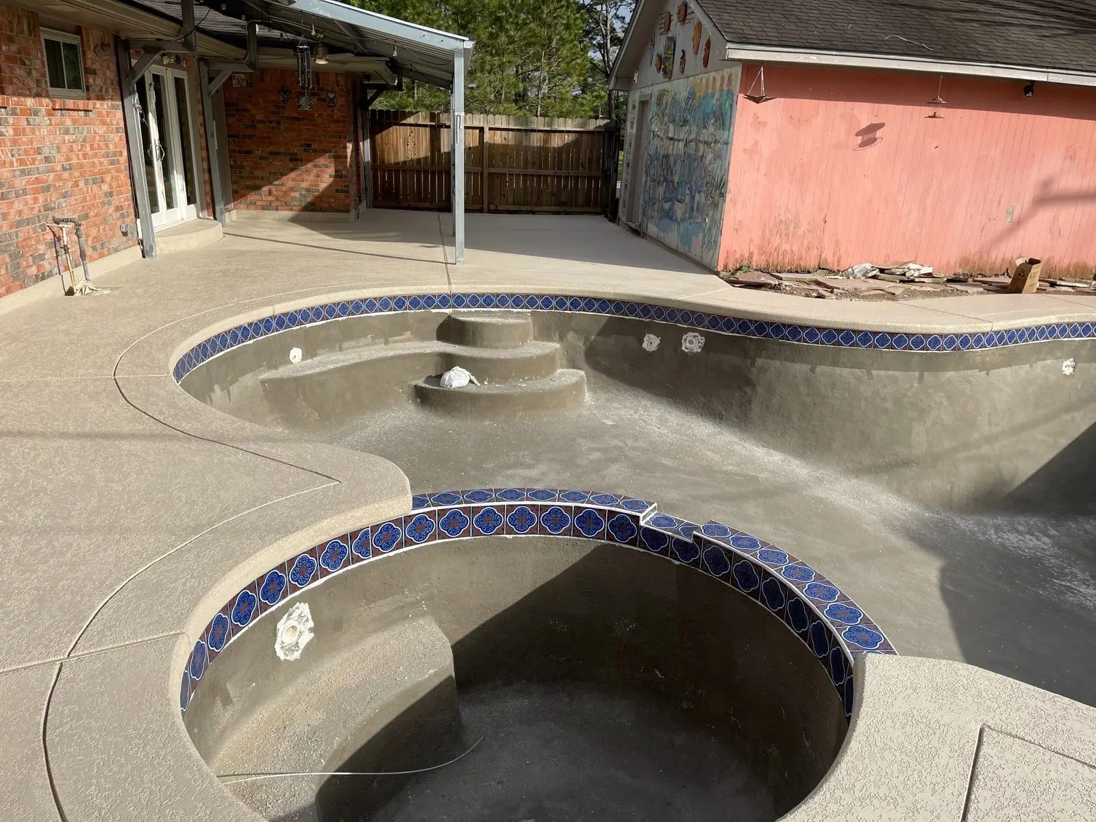 Pool remodel with new tile and interior preparation before replastering