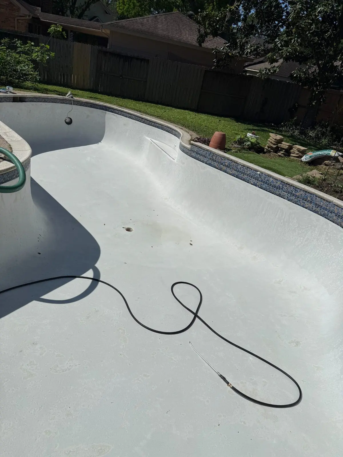 Swimming pool cleaning and replastering project