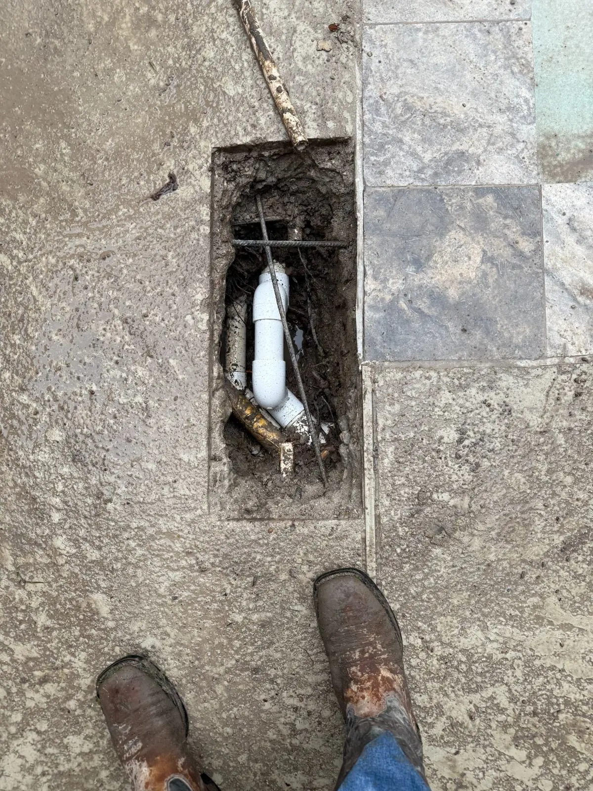 Targeted swimming pool leak repair below the pool deck