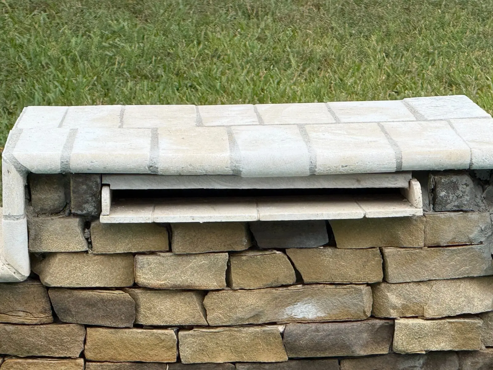 Stone swimming pool waterfall repair