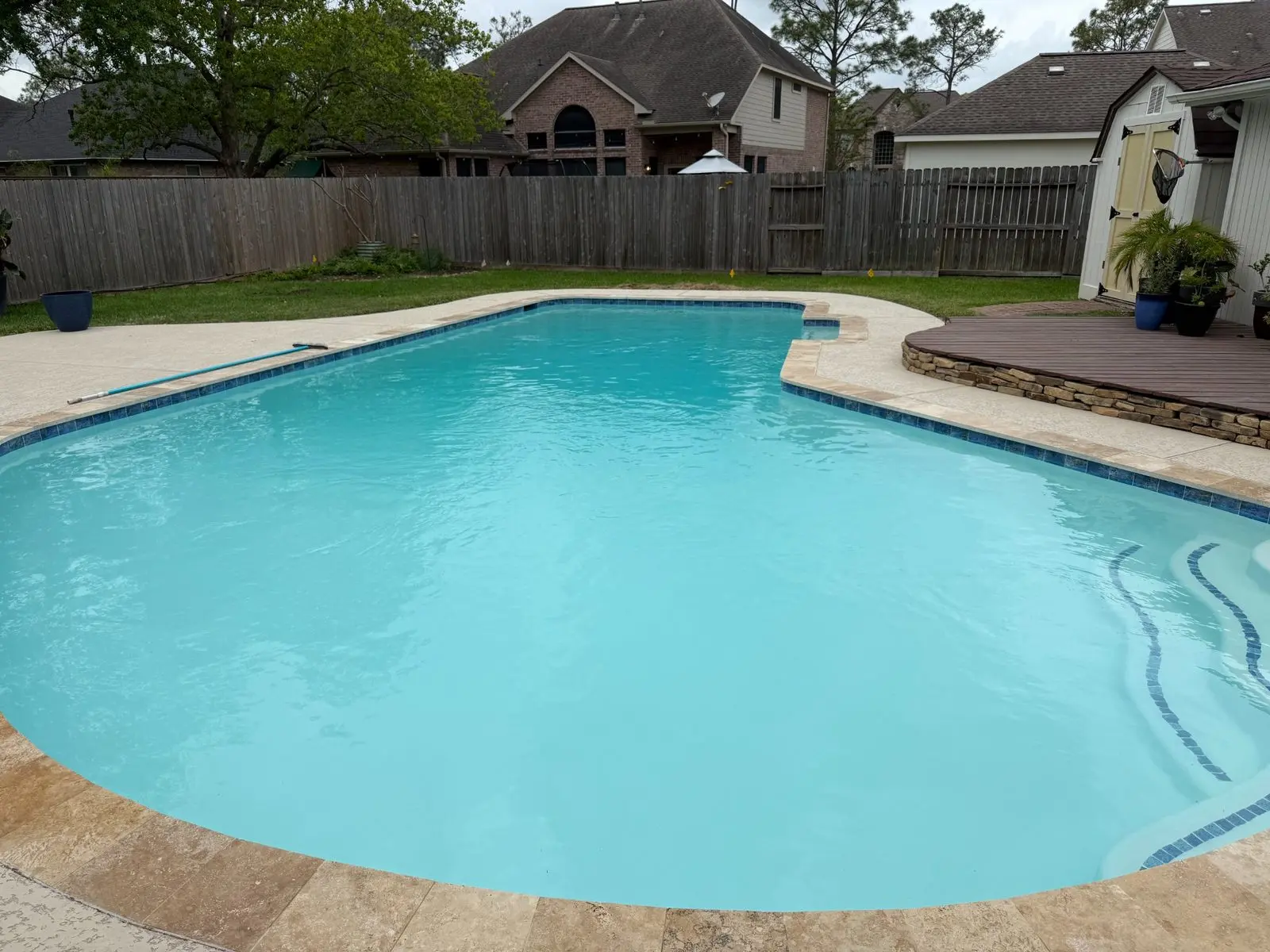Backyard swimming pool refilled after replastering and renovation