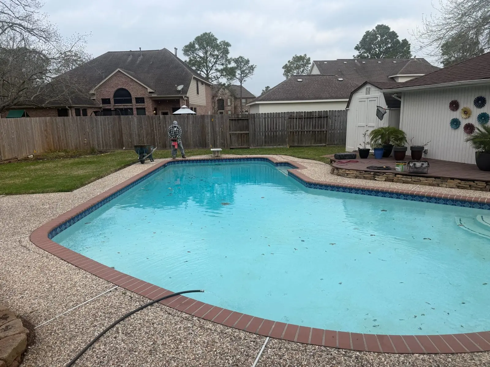 Swimming pool being filled after remodeling and renovation