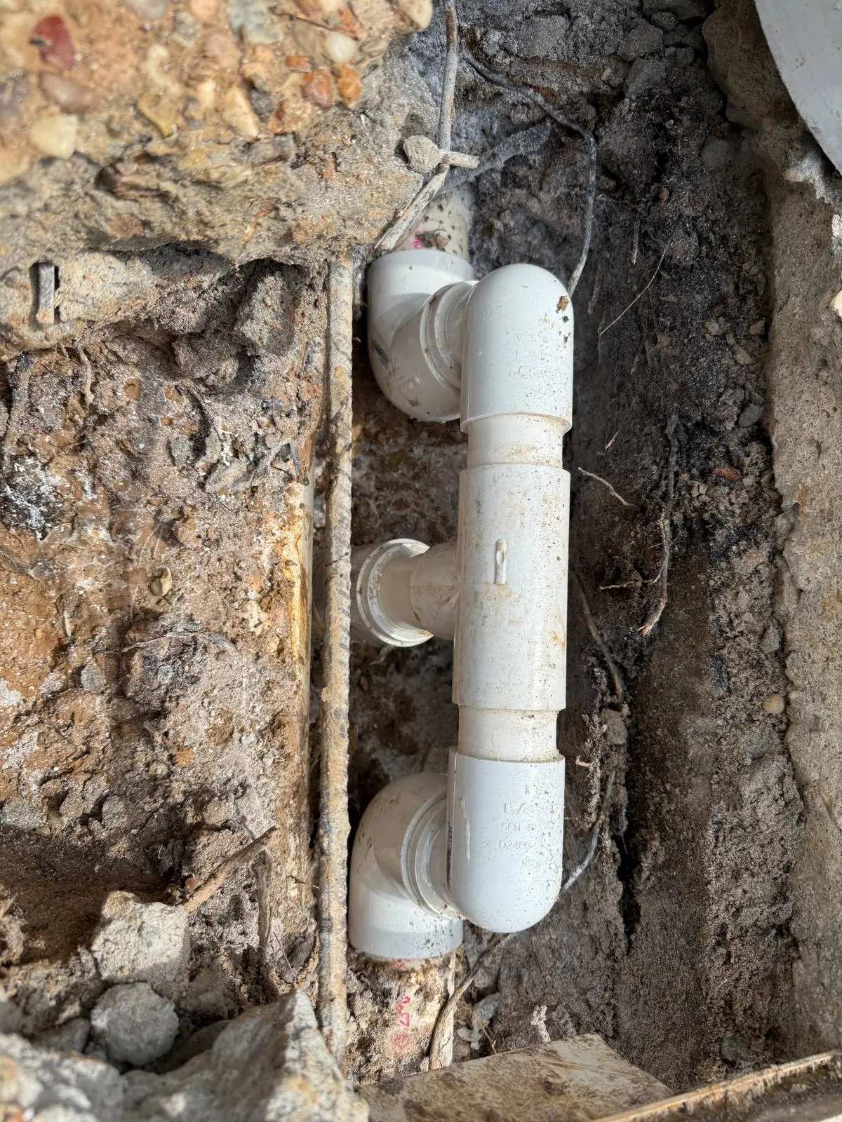 Underground swimming pool plumbing manifold replacement